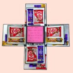 ROTATING TEDDY BEAR WITH MIX CHOCOLATES AND PHOTOS IN CEB By GiftsMyStore